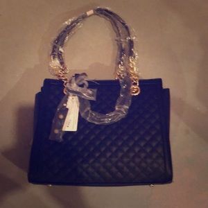 Charlotte Daniel black wallet and purse set.